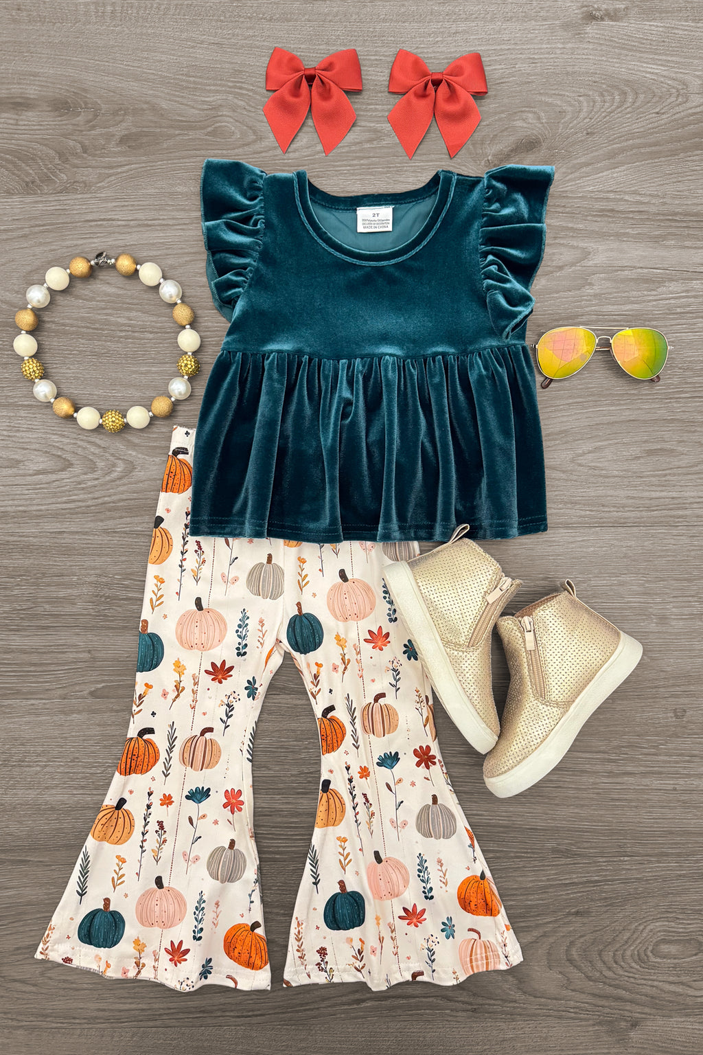 Velvet Pumpkin Flare Set - 6-12 Months - Teal velvet ruffled sleeve top with cream bell-bottom pants featuring pumpkins, paired with gold boots, orange bows, and.