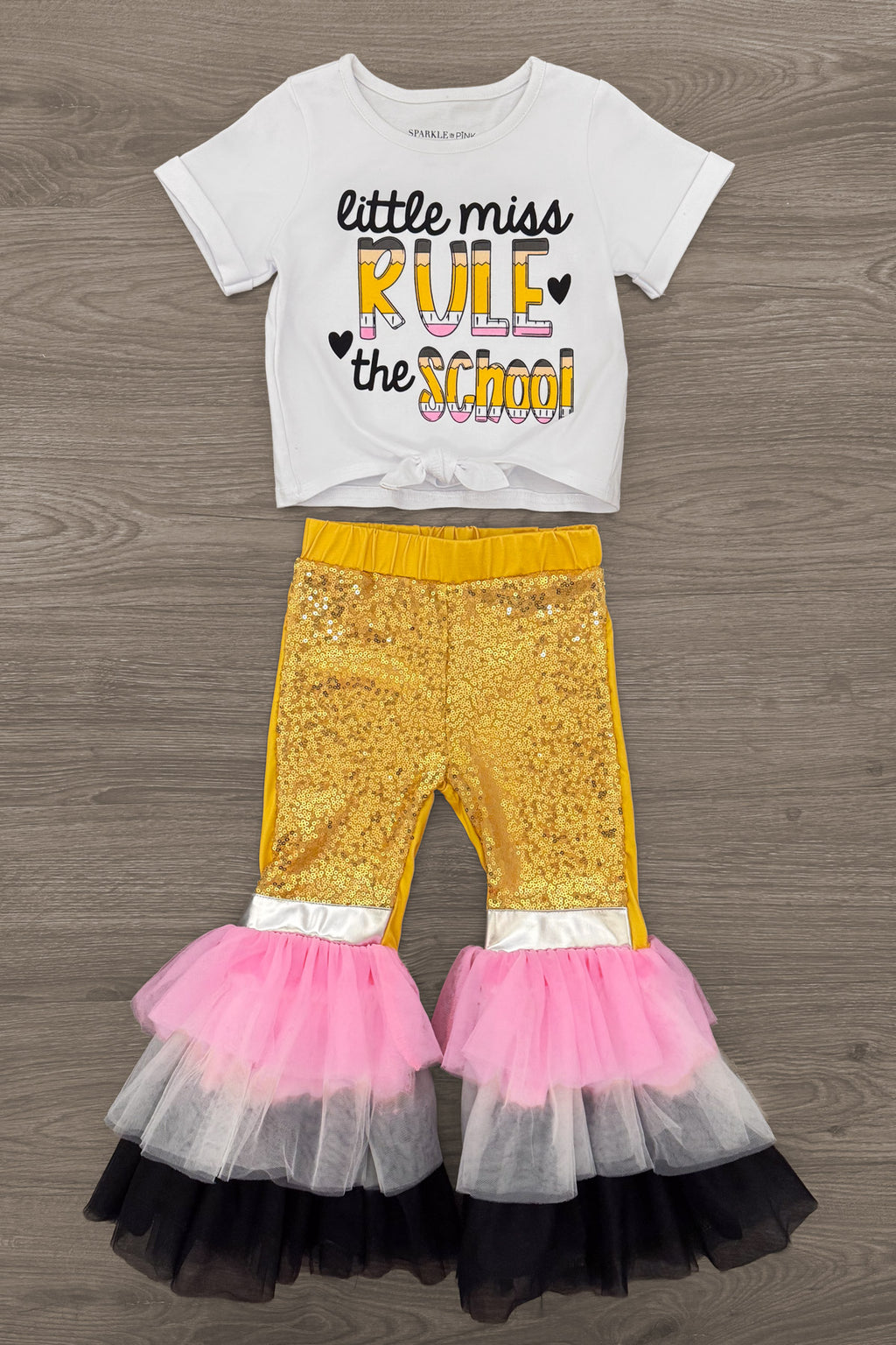"Little Miss Rule The School" Bell Bottom Set - 3T - White short-sleeve crop top with “little miss rule the school” text in black and yellow, paired with gold velvet bell.