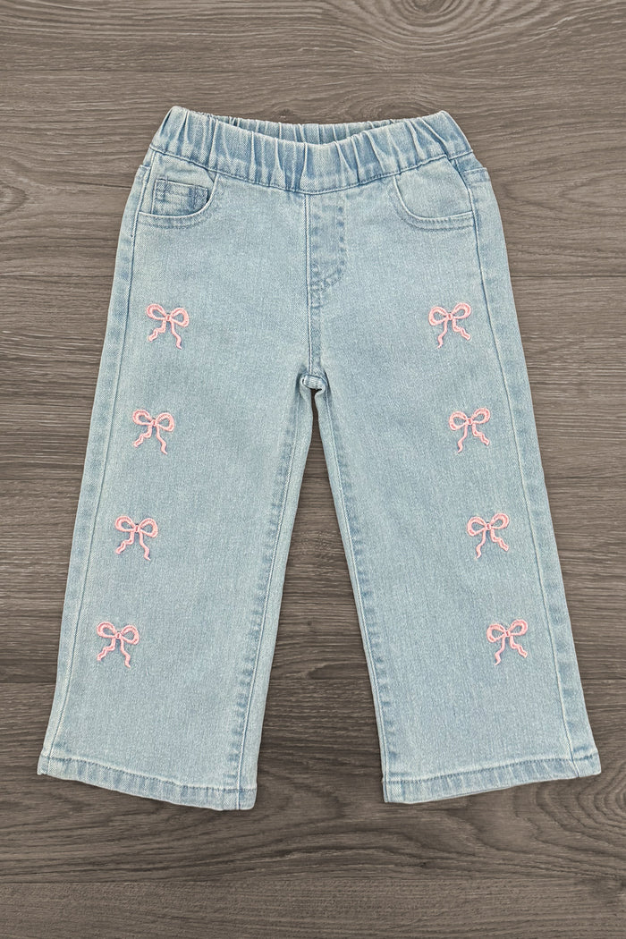 Pink Denim Bow Pants - 6-12 Months - Light blue denim pants with elastic waistband and small pink embroidered bows on front legs.