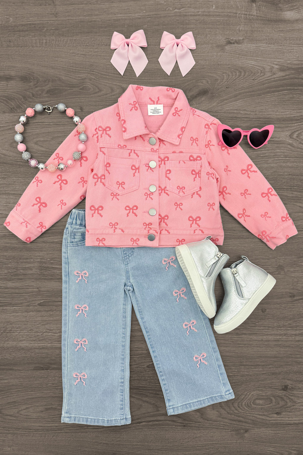 Pink Denim Bow Pants - 6-12 Months - Pink denim jacket with embroidered bows, matching light blue denim pants with bow details, white boots, pink bow hair clips,