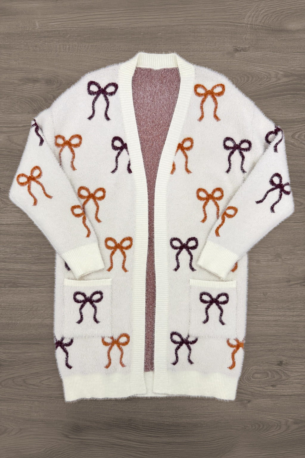 Mom & Me - Cozy Cream Bow Cardigan - MOM-XS - Cream knit cardigan with burgundy and rust bow patterns, open front design.