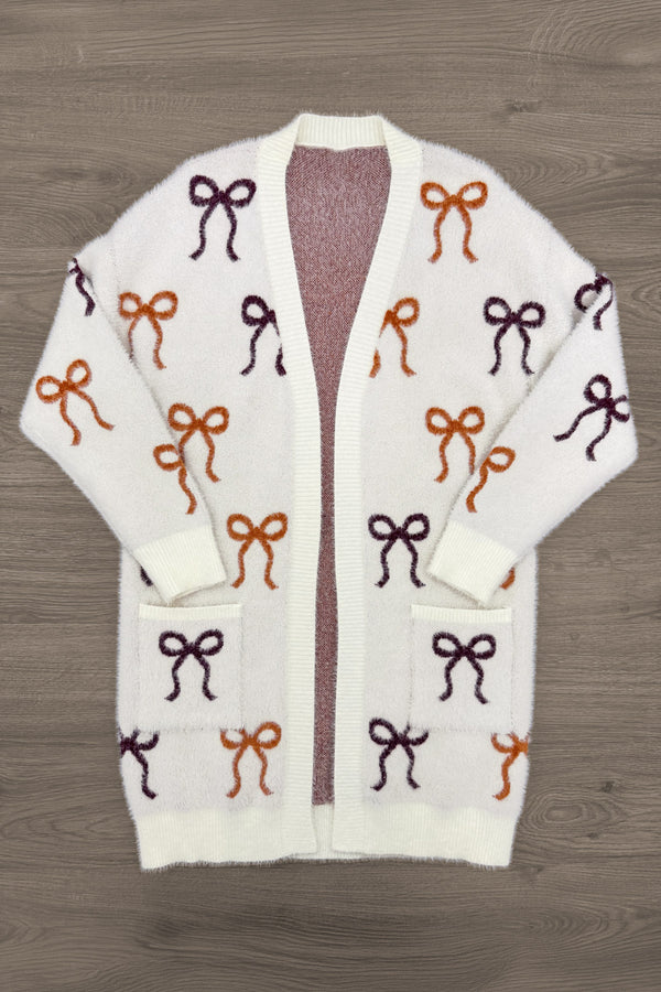Mom & Me - Cozy Cream Bow Cardigan - MOM-XS - Cream knit cardigan with burgundy and rust bow patterns, open front design.