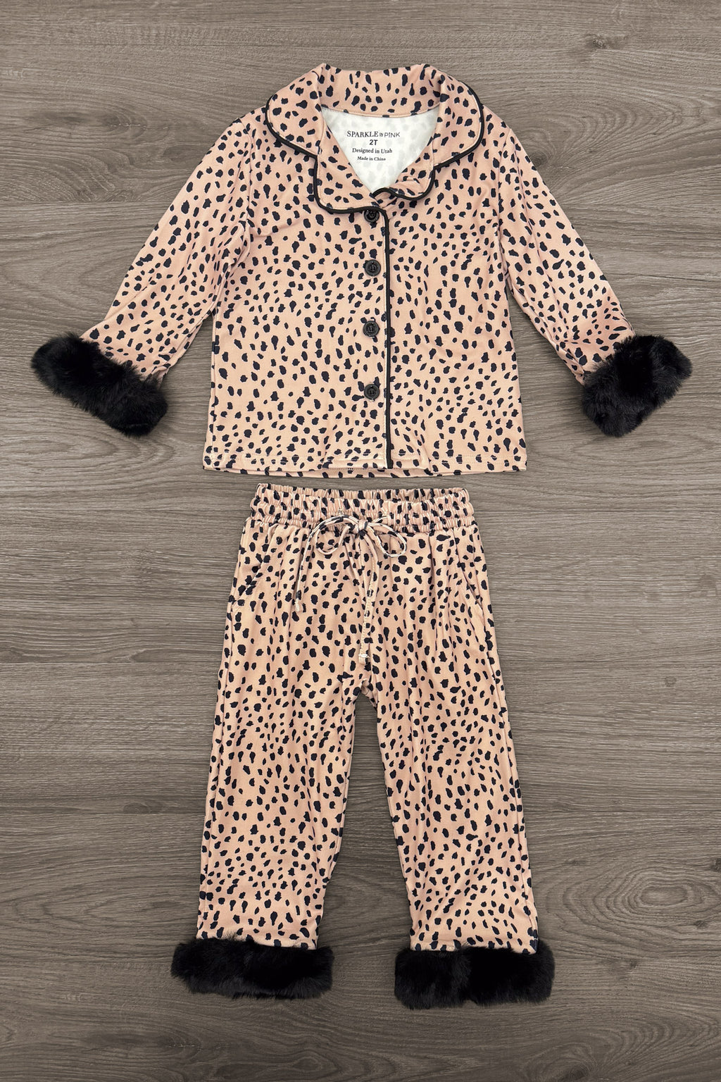Mom & Me - Fuzzy Cheetah Pajamas - CHILD-6-12 Months - Fuzzy cheetah print pajama set with black trim on collar, cuffs, and pant hems.