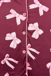 Mom & Me - Fuzzy Pink Bow Pajamas - CHILD-6-12 Months - Burgundy button-up pajamas with pink fuzzy bow prints and pink piping along the edges.