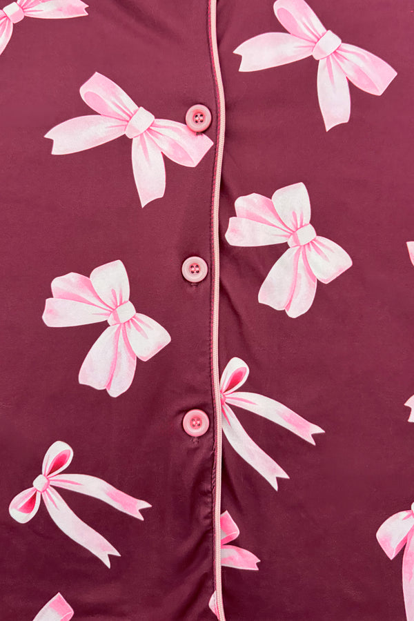 Mom & Me - Fuzzy Pink Bow Pajamas - CHILD-6-12 Months - Burgundy button-up pajamas with pink fuzzy bow prints and pink piping along the edges.