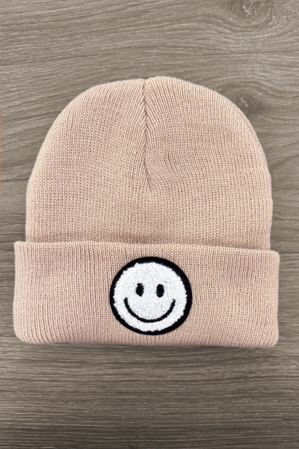 Smiley Face Beanies - Tan - Tan knit beanie with folded cuff featuring a black and white smiley face patch at center front.