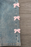 Pink Chenille Bow Denim Pants - 3-6 Months - Light blue denim pants featuring three soft pink chenille bows vertically aligned on the outer seam.