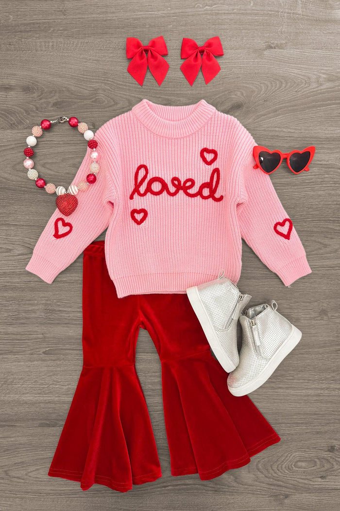 "Loved" Knit Sweater Bell Bottom Set - 3XS-6-12 Months - Pink knit sweater with red "loved" text and heart details, red velvet bell-bottom pants, white boots, red heart-shaped.