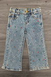 Gemstone Denim Pants - 6-12 Months - Light wash denim pants with colorful gemstone embellishments scattered across the fabric, featuring a button and zipper.