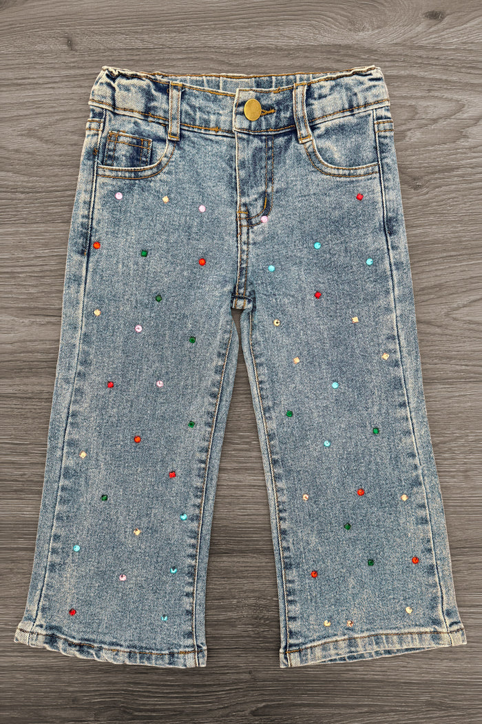 Gemstone Denim Pants - 6-12 Months - Light wash denim pants with colorful gemstone embellishments scattered across the fabric, featuring a button and zipper.