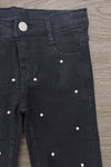 Striped Sweater Cardigan Denim Pant Set - 6-12 Months - Black denim pants with pearl embellishments and silver button closure on a wood surface.