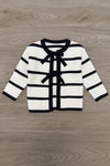 Striped Sweater Cardigan Denim Pant Set - 6-12 Months - White cardigan with black horizontal stripes and black trim, featuring front bow ties and a chest pocket.