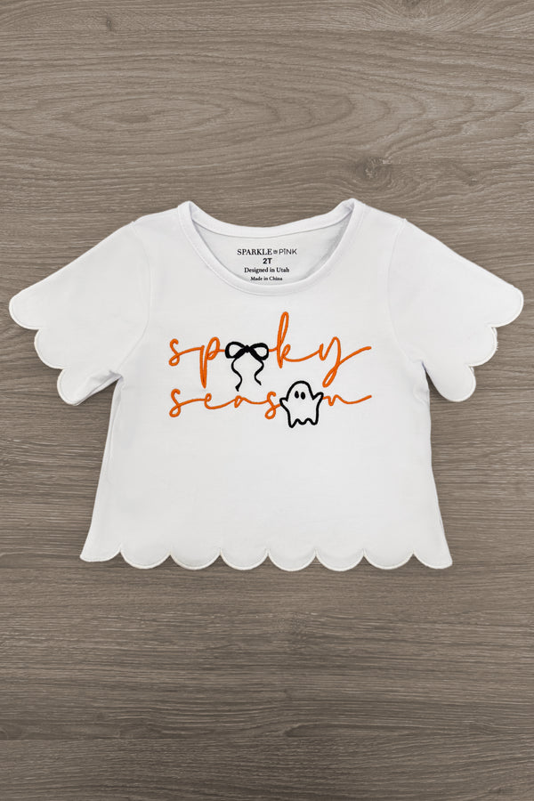"Spooky Season" Bow Denim Pant Set - 6-12 Months - White short-sleeve crop top with scalloped edges and orange "spooky season" text with a small ghost graphic.