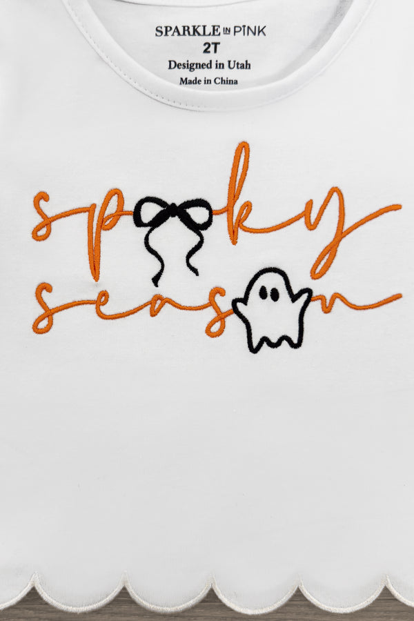 "Spooky Season" Bow Denim Pant Set - 6-12 Months - White toddler long-sleeve top with scalloped hem and orange "spooky season" text featuring a black bow and ghost graphic.