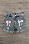 "Pre-K - Sixth Grade" Plaid Bow Denim Short Set - PRE-K / 2T - Denim shorts with distressed hems and pink and blue plaid bow patches on front pockets.