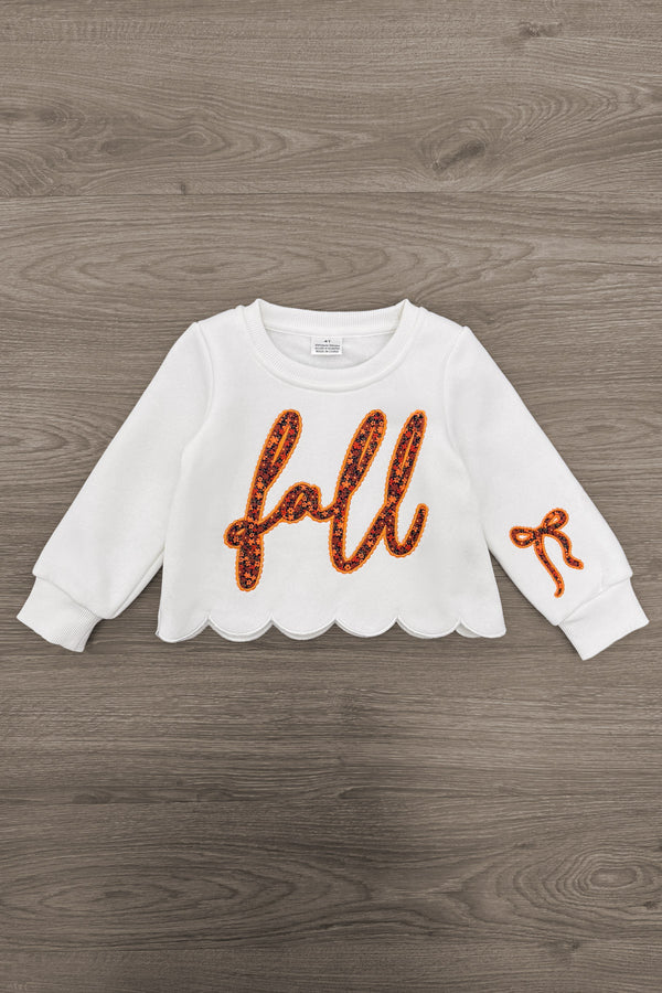 "Fall" Rust Floral Suede Skirt Set - 6-12 Months - White long-sleeve top with scalloped hem, rust floral "fall" text on front, and bow detail on sleeve.
