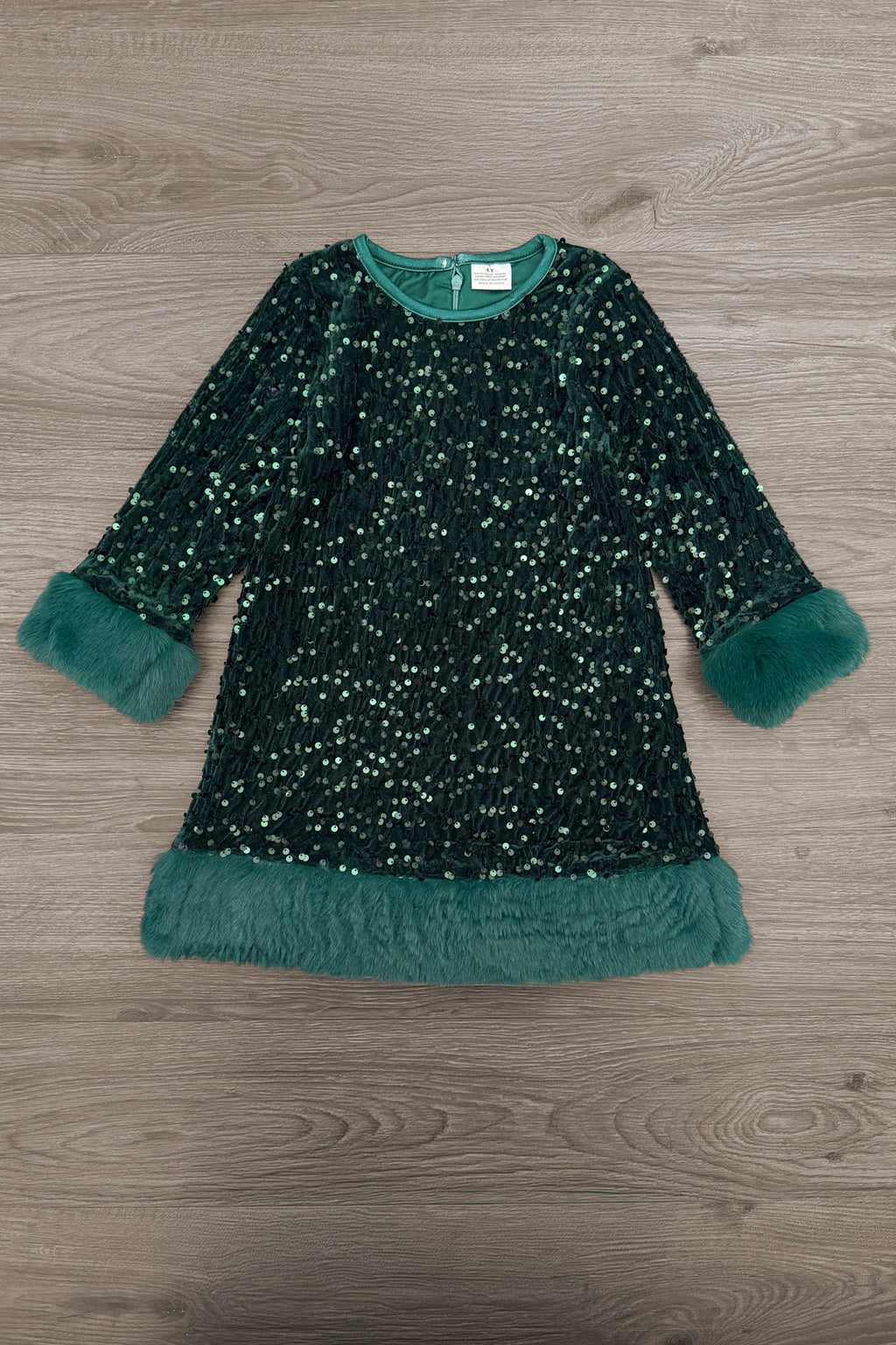 Sparkle Plush Sequin Long Sleeve Dress - Green / 6-12 Months - Dark green long sleeve mini dress with sparkling sequins, plush velvet cuffs, and ruffled hem.