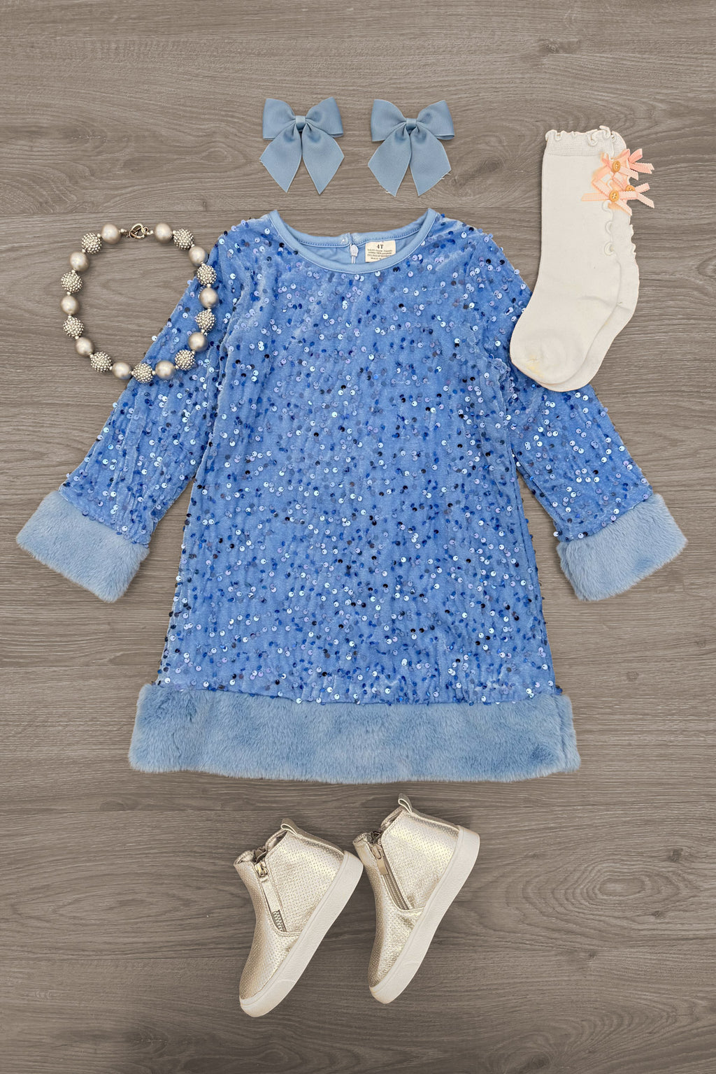 Sparkle Plush Sequin Long Sleeve Dress - Green / 6-12 Months - Blue plush sequin long sleeve dress with velvet cuffs and hem, paired with blue bow clips, cream socks with orange flower,.