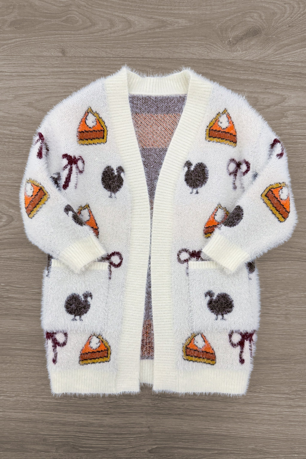 Mom & Me - Cozy Thanksgiving Cardigan - CHILD-6-12 Months - Cream-colored fuzzy cardigan with Thanksgiving-themed patches including pumpkin pie slices, turkeys, and candy canes,.