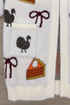 Mom & Me - Cozy Thanksgiving Cardigan - CHILD-6-12 Months - Cream knit cardigan with turkey, bow, and pumpkin pie patterns in warm fall colors.
