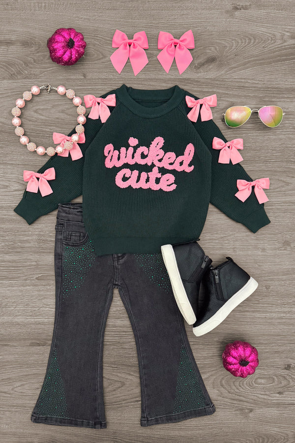 "Wicked Cute" Denim Flare Set - 6-12 Months - Black denim flare jeans with green "wicked cute" sweatshirt featuring pink bows and black high-top sneakers.