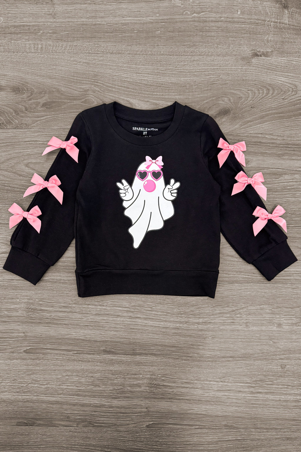 Bubblegum Ghost Denim Bell Bottom Set - 6-12 Months - Black denim long-sleeve top with pink bows on sleeves and a cartoon bubblegum pink ghost graphic on the front.