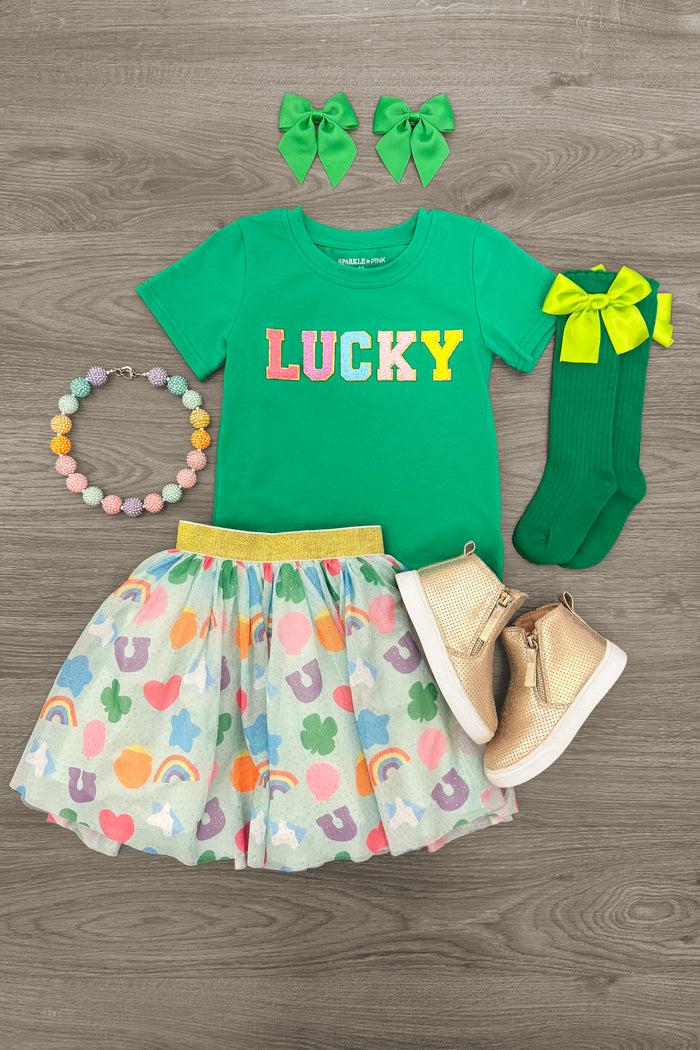 "Lucky" Charms Tutu Skirt Set - 3XS-6-12 Months - Green "Lucky" t-shirt with colorful letters, pastel heart-print tutu skirt, matching green socks with yellow bow, green hair .