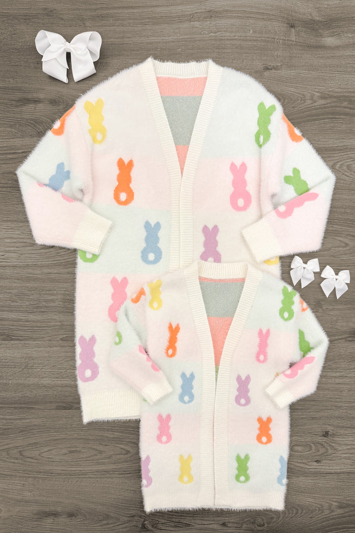 Mom & Me - Cozy Pastel Bunny Cardigan - CHILD-3XS-6-12 Months - White cozy cardigan with pastel rainbow bunny patterns, V-neck, long sleeves, ribbed cuffs and hem, laid flat with matching.