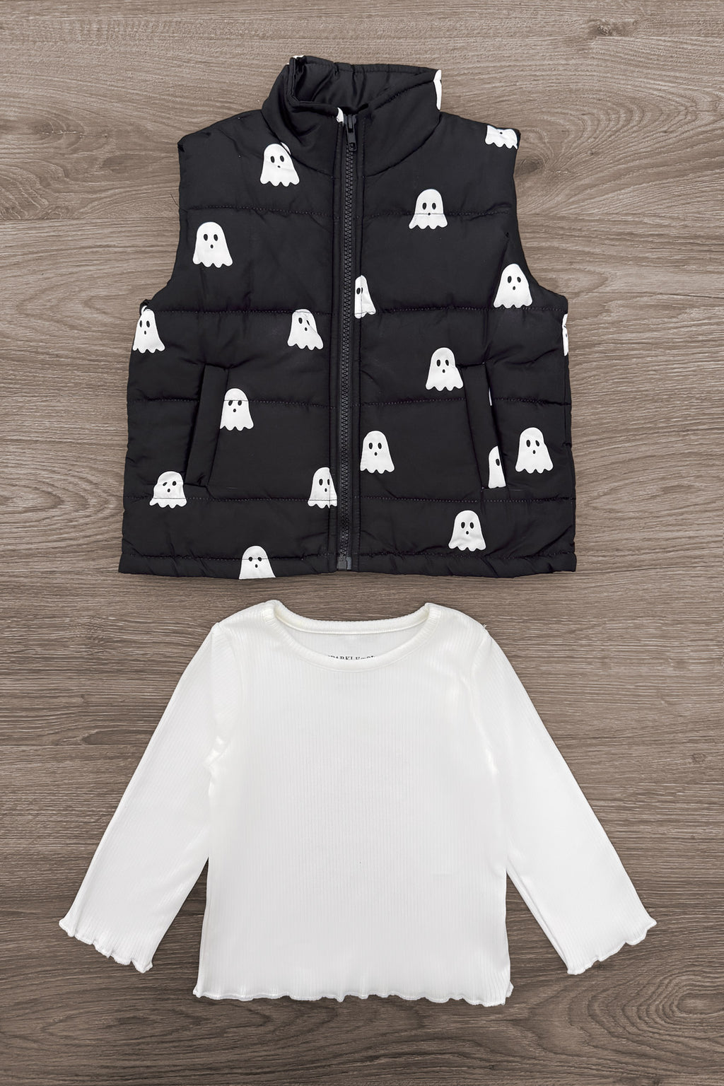 Mom & Me - Ghost Vest Set - CHILD-6-12 Months - Black puffer vest with white ghost prints paired with a white long-sleeve shirt featuring scalloped edges.