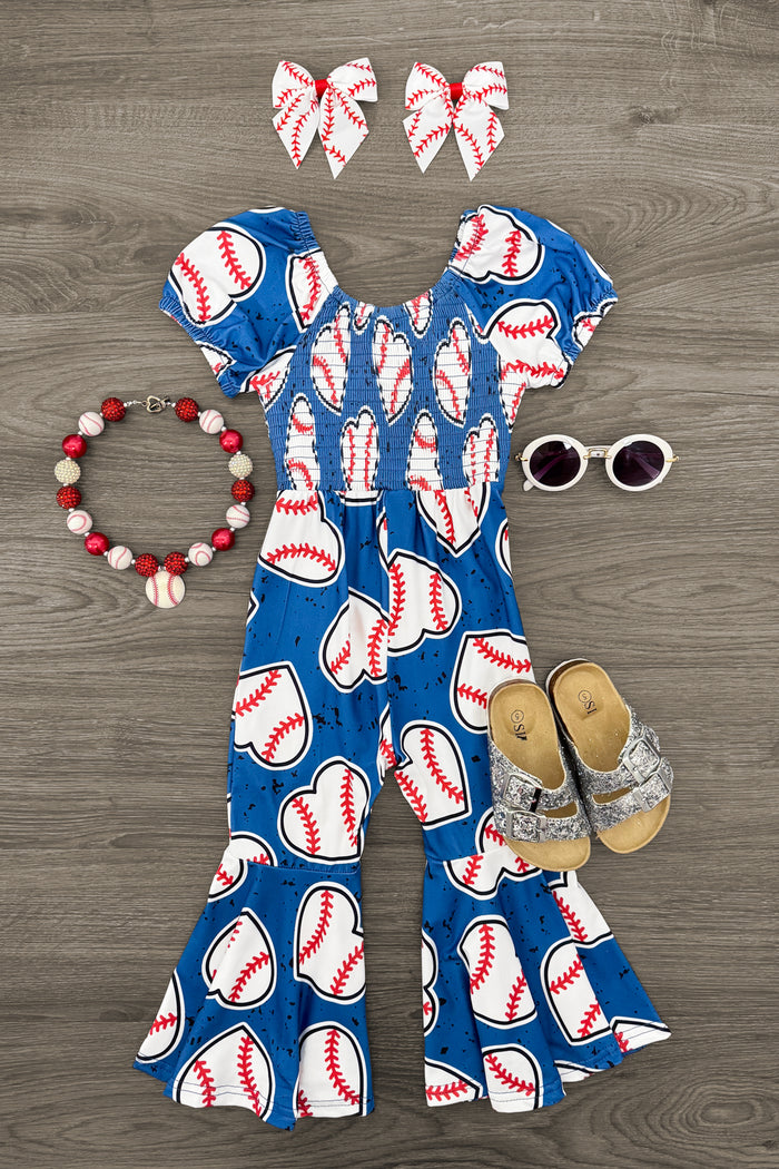 Blue Baseball Heart Jumpsuit - 6-12 Months - Blue jumpsuit with baseball print, puff sleeves, and flared legs, paired with white sunglasses, bow hair clips, a beaded.