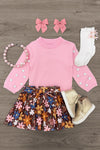 Pink & Brown Floral Skirt Set - 6-12 Months - Pink long-sleeve top with puff sleeves paired with a brown floral pleated skirt, white socks with ruffles, gold boots, pink.