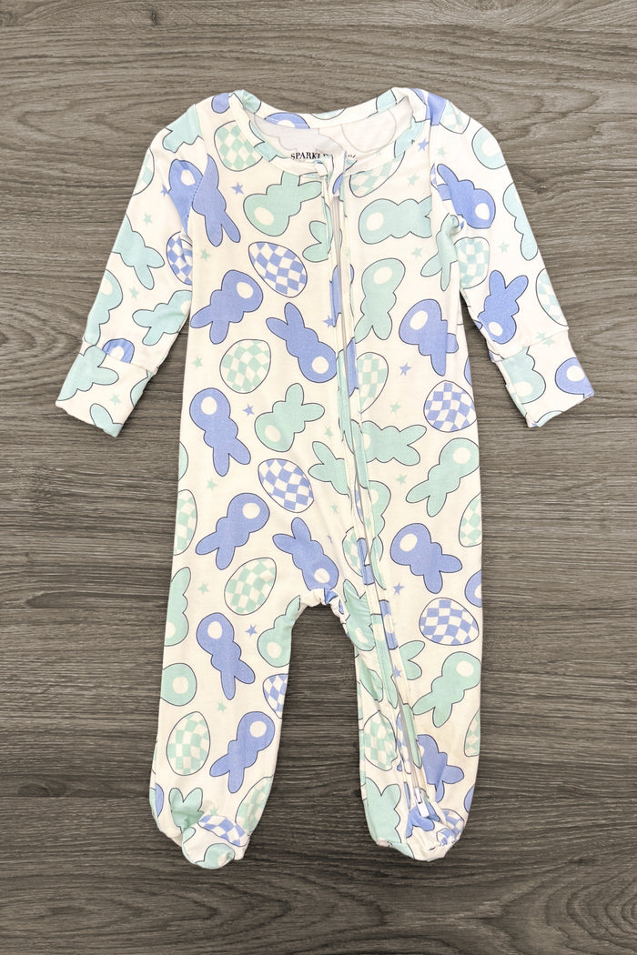 Bamboo Peep Onesie - Newborn - Long-sleeve white baby onesie with blue and mint animal shapes and footed legs.