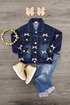 Plaid Bow Denim Jacket - 6-12 Months - Dark blue denim jacket with plaid bow accents, paired with light blue rolled jeans, beige boots, and a beaded bracelet.