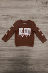 "Be Kind" Cheetah Denim Bell Bottom Set - 6-12 Months - Brown long-sleeve sweatshirt with "BE KIND" text in white cheetah pattern and cheetah paw prints down the sleeves.