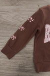 "Be Kind" Cheetah Denim Bell Bottom Set - 6-12 Months - Brown denim bell bottom set top with pink cheetah print bows on the sleeve and block letter "B" on the chest.