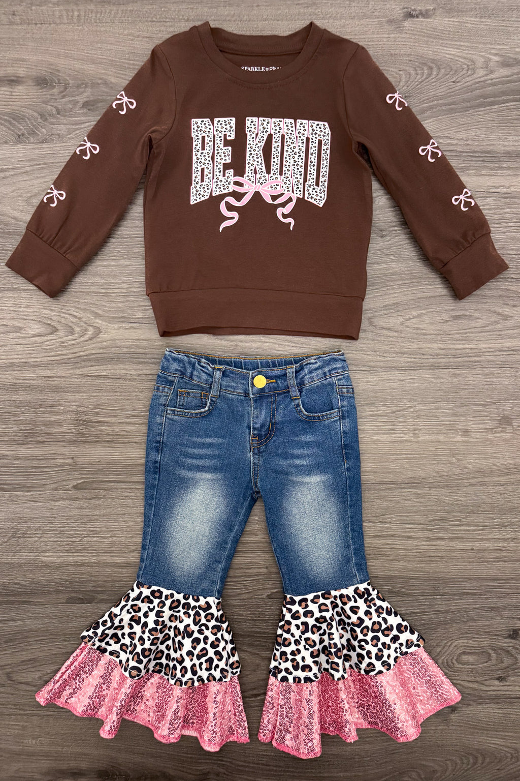 "Be Kind" Cheetah Denim Bell Bottom Set - 6-12 Months - Brown long-sleeve shirt with "BE KIND" text and leopard print accents paired with blue denim bell-bottom jeans featuring.