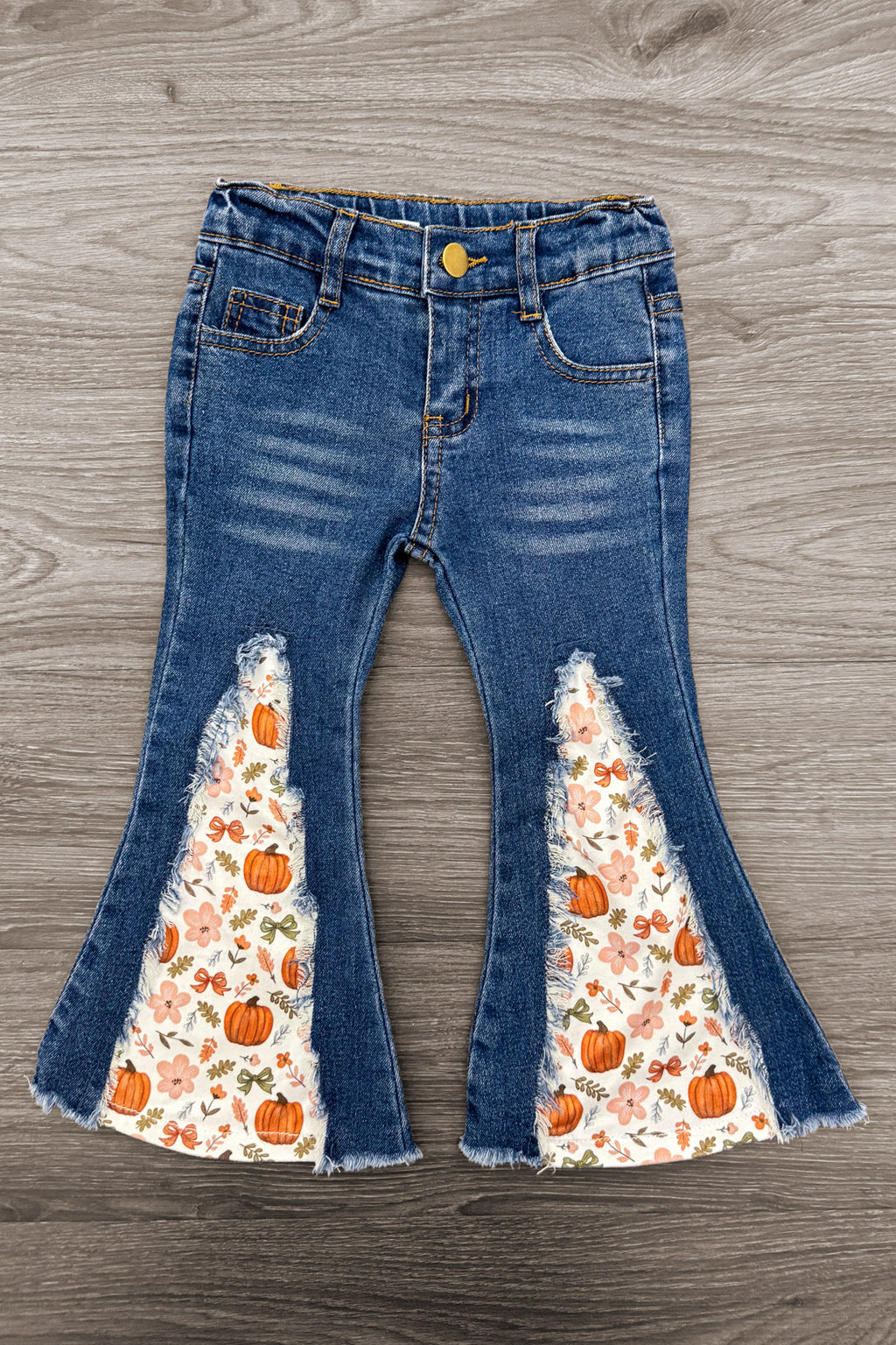 Pumpkins & Bows Flare Denim Pant Set - 6-12 Months - Blue denim flare pants with high waist, featuring orange pumpkin and white floral fabric inserts in the front flared legs.