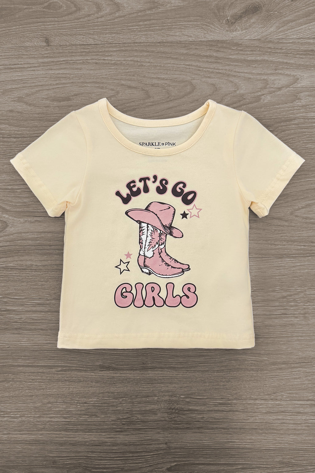 "Let's Go Girls" Bell Bottom Vest Set - 3 Piece - 6-12 Months - Cream short-sleeve t-shirt with pink cowboy boots graphic and "Let’s Go Girls" text in playful font.