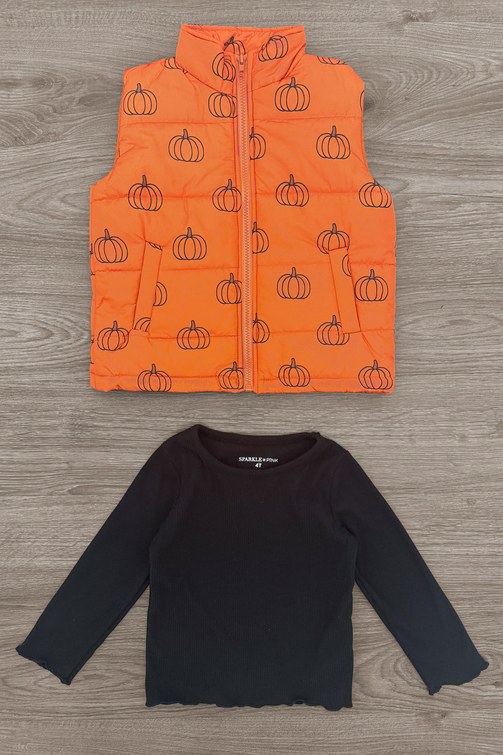 Mom & Me - Pumpkin Vest Set - CHILD-6-12 Months - Orange quilted vest with pumpkin print paired with black long-sleeve ribbed shirt with scalloped edges.