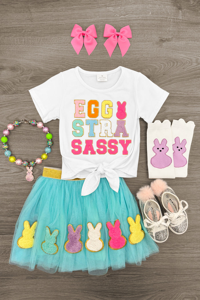 "Eggstra Sassy" Chenille Patch Tutu Skirt Set - 3XS-6-12 Months - White short-sleeve tied tee with colorful "Eggstra Sassy" text, turquoise tutu skirt with pastel chenille bunny patches,.