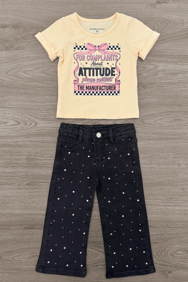 "For Complaints About Attitude.." Denim Pant Set - 6-12 Months - Cream short-sleeve t-shirt with graphic text paired with black denim pants featuring small white polka dots.