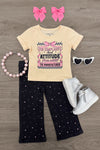 "For Complaints About Attitude.." Denim Pant Set - 6-12 Months - Cream short-sleeve graphic tee with colorful text and black wide-leg denim pants with small white and pink hearts, paired.