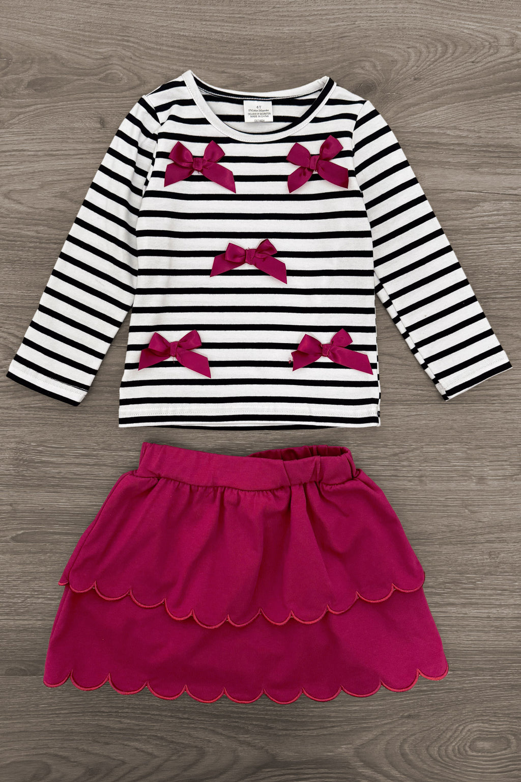 Striped Burgundy Bow Skirt Set - 6-12 Months - White and black striped long-sleeve top with burgundy bow accents paired with a scalloped burgundy skirt.