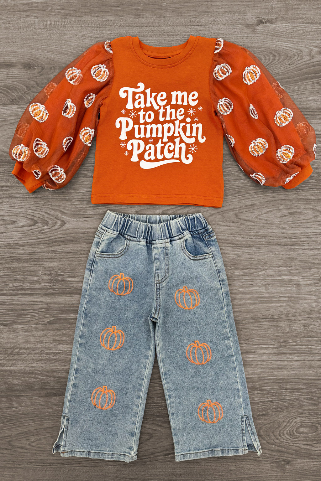 "Take Me To The Pumpkin Patch" Denim Pant Set - 6-12 Months - Orange long-sleeve top with puffed sleeves and white "Take me to the Pumpkin Patch" text paired with light blue denim pants.