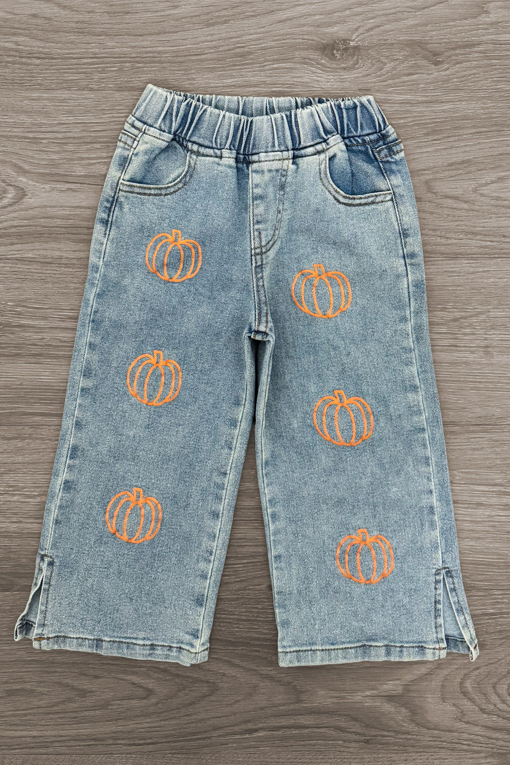 "Take Me To The Pumpkin Patch" Denim Pant Set - 6-12 Months - Light wash denim pants with elastic waistband and orange pumpkin prints down front legs.