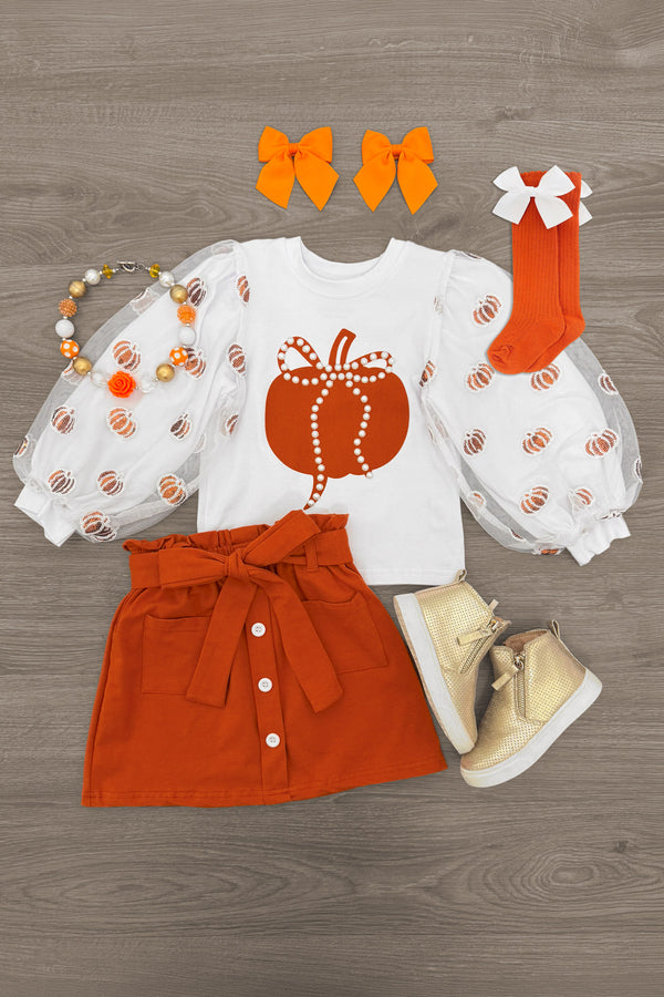 Pearl & Sequin Rust Pumpkin Skirt Set - 6-12 Months - Rust orange skirt with buttons and belt paired with white puff-sleeve top featuring a pearl and sequin pumpkin design.