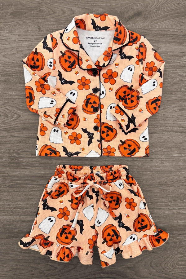 Mom & Me - Halloween Waffle Knit Pajamas - CHILD-6-12 Months - Orange waffle knit pajamas with black trim, featuring smiling pumpkin and ghost patterns, long-sleeve top and ruffled shorts.