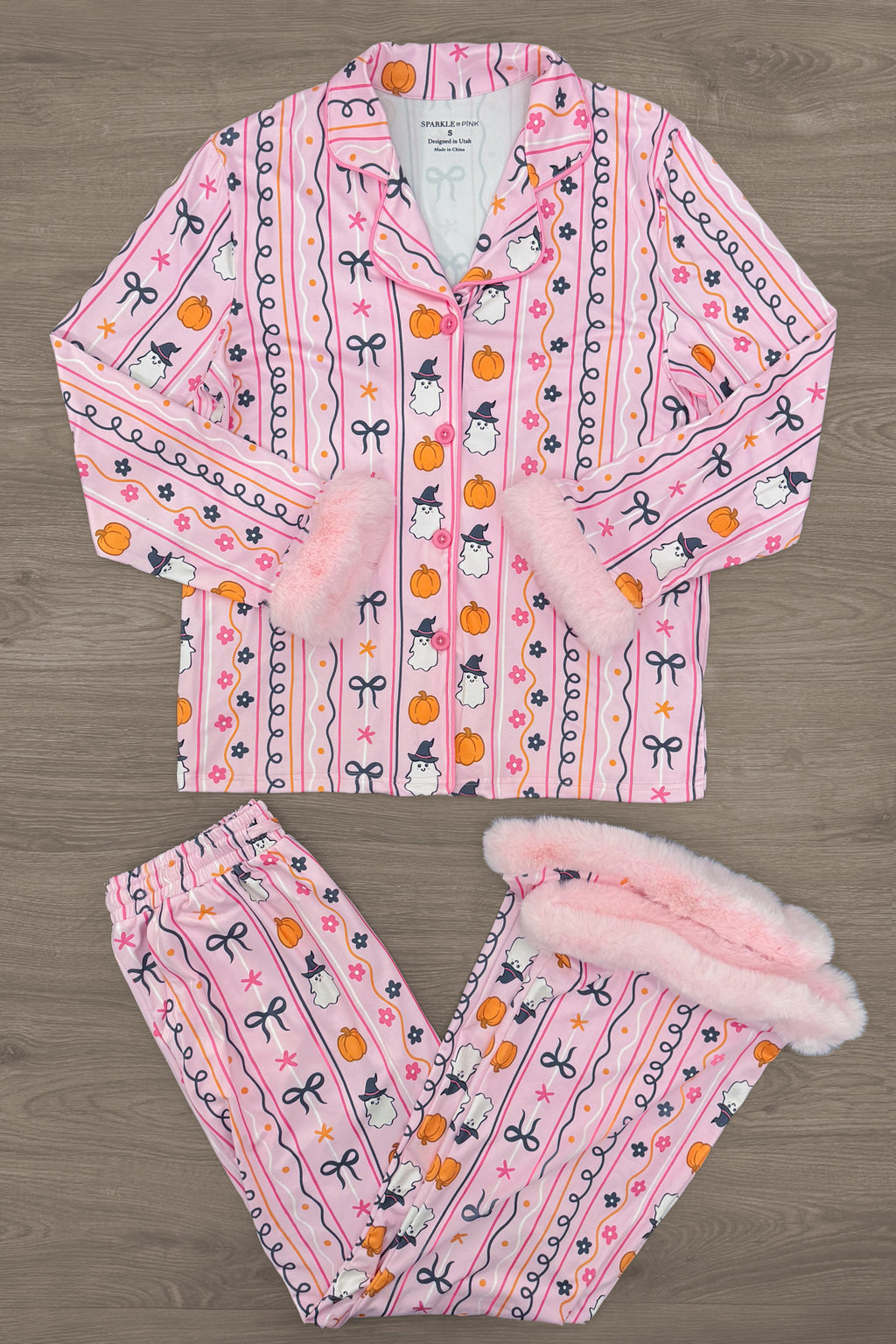 Mom & Me - Fuzzy Pumpkin & Ghost Pajamas - MOM-XS - Pink fuzzy pajamas set with pumpkin and ghost patterns, button-up top, and fluffy cuffs on sleeves and pants.