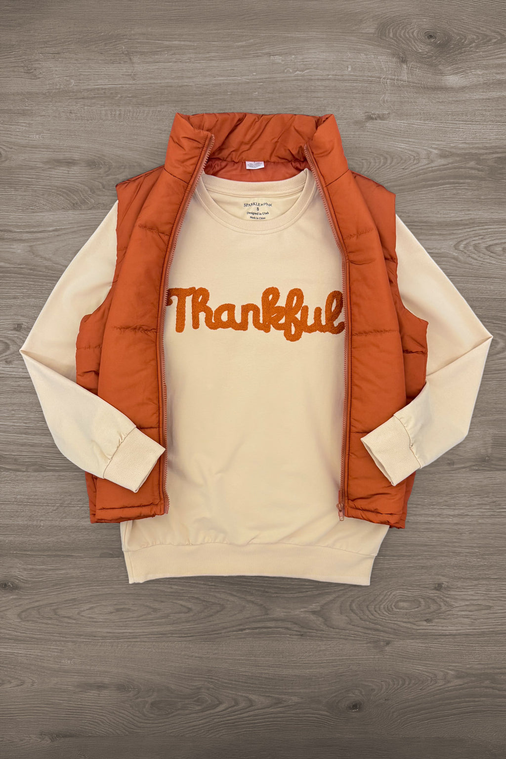 Mom & Me - "Thankful" Vest Set - MOM-XS - Cream long-sleeve shirt with orange "Thankful" script paired with a sleeveless burnt orange quilted vest.