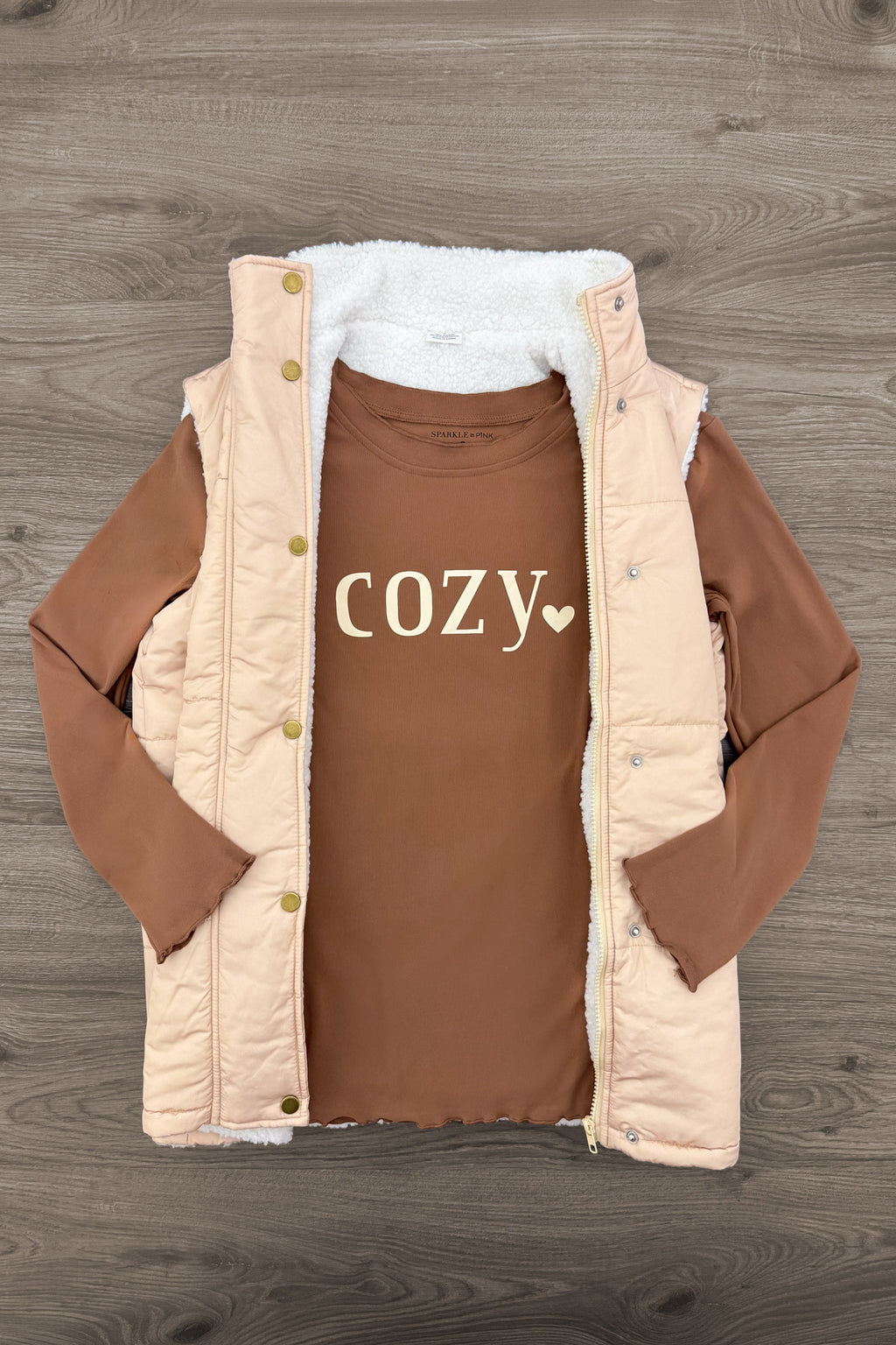 Mom & Me - "Cozy" Vest Set - MOM-XS - Tan quilted sleeveless vest with snap buttons paired with brown long-sleeve shirt featuring "COZY" text and heart detail.